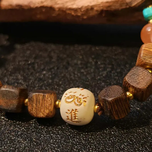 close up of green agarwood cube beads handcrafted wooden bead bracelet detail