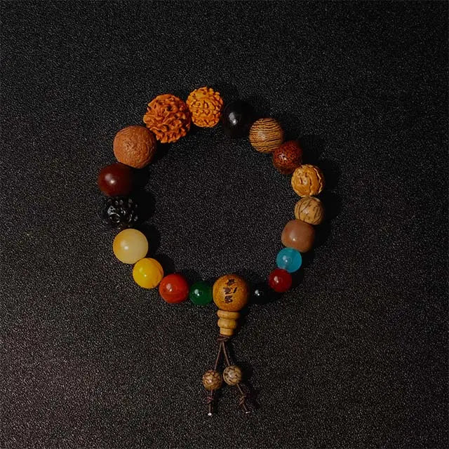 Handcrafted Bodhi Mala bracelet made of 18 natural ebony wood and agate stone beads, designed for yoga, meditation, and mindfulness practice.