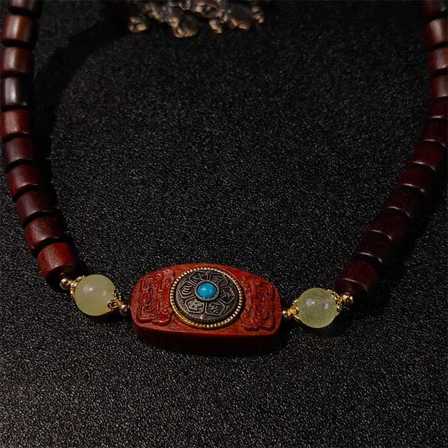 Handcrafted spiritual energy bracelet made of smooth rosewood beads, wrapped twice for a layered look. This grounding bracelet promotes balance and prosperity, perfect for daily mindfulness and intention setting.