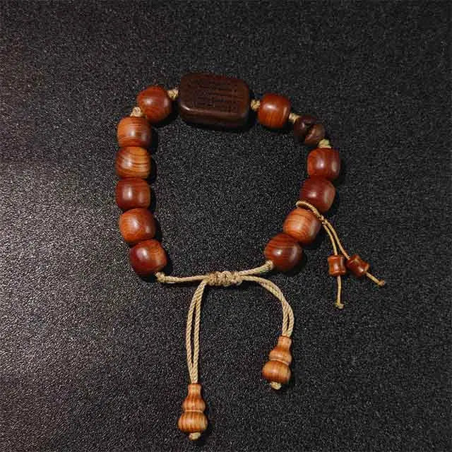 Natural wood mala prayer bracelet, handmade with Thuja and Black Persimmon. A meaningful and grounding gift for spiritual practice or daily wear.
