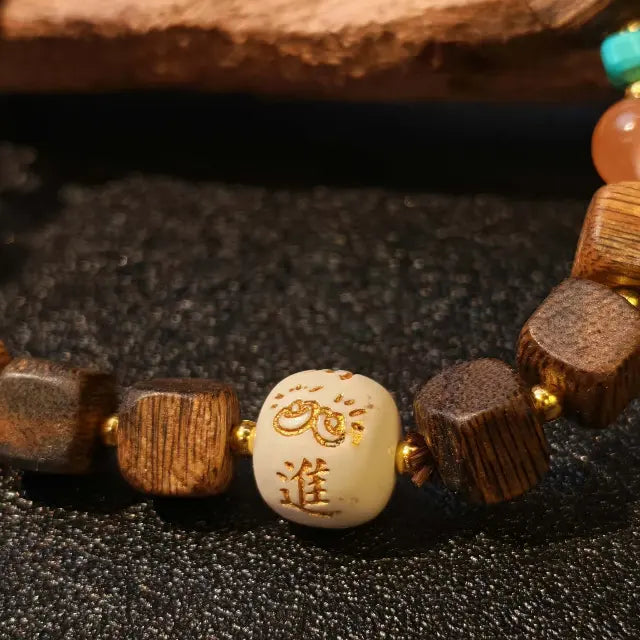 close up of green agarwood cube beads handcrafted wooden bead bracelet detail
