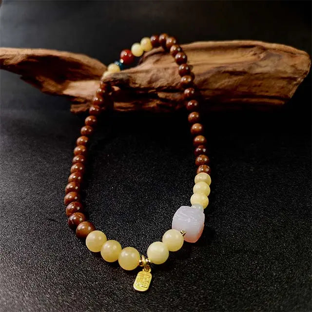 Spiritual handmade bracelet combining Bodhi seeds and jade beads in a double loop design, ideal for meditation, mindfulness, and harmony.