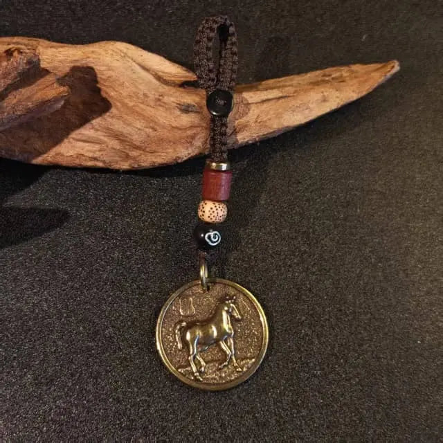 solid brass horse keychain with double sided horse and bagua pendant and traditional woven cord
