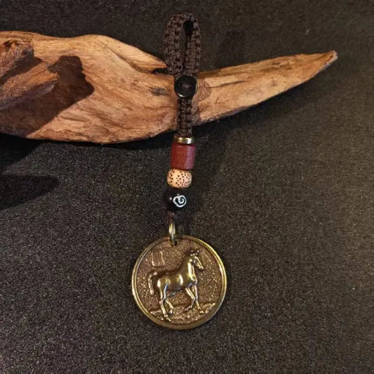 solid brass horse keychain with double sided horse and bagua pendant and traditional woven cord