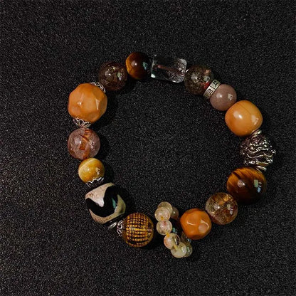 Wear this natural Golden Rutilated Quartz (Super Seven) healing bracelet for meditation, chakra alignment, and positive energy in daily life.