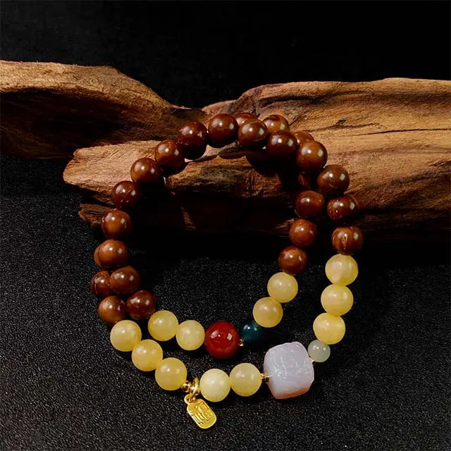 Double loop Buddhist mala bracelet with Bodhi seeds and jade beads, used for meditation, focus, and cultivating positive energy in daily life.