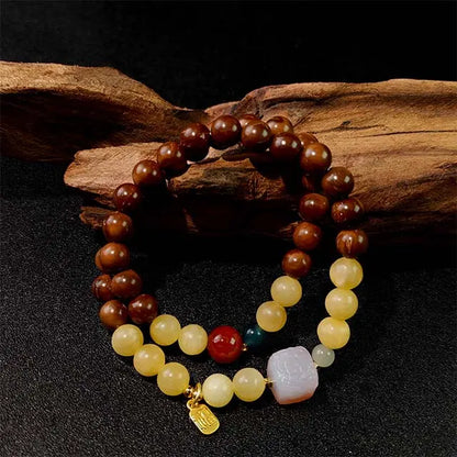 Double loop Buddhist mala bracelet with Bodhi seeds and jade beads, used for meditation, focus, and cultivating positive energy in daily life.