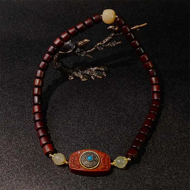 Rosewood double wrap bracelet for grounding and abundance, an elegant handmade accessory for everyday wear. The natural wood beads and secure wrap design symbolize stability and positive energy flow, ideal for gifting or personal use.
