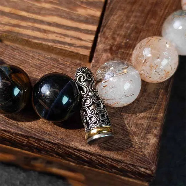 Meaningful gift idea: This powerful Tiger‘s Eye and Super Seven crystal bracelet in Tibetan silver helps with energy protection and balance, perfect for mindfulness and wellness enthusiasts.