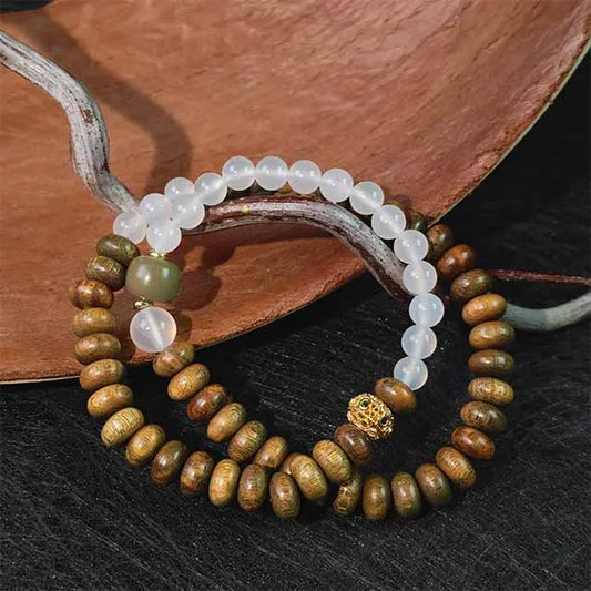 Handmade double wrap bracelet with green sandalwood and white agate beads, natural spiritual jewelry for mindfulness and energy balance.