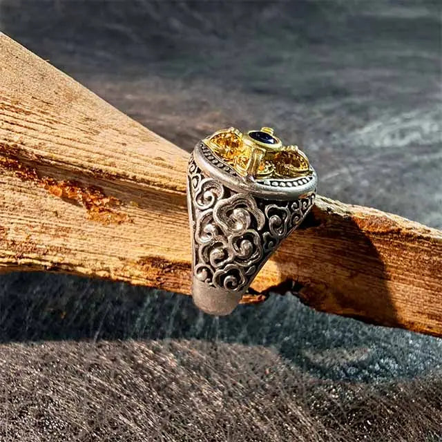 Unique statement ring for men in hand-hammered copper, centered with the bold crossed Dorje, a sacred Buddhist symbol.
