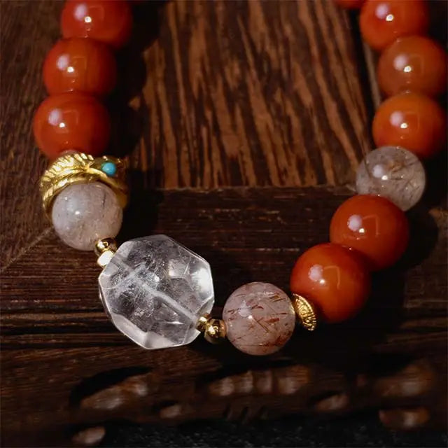 Natural stone bracelet featuring Red Agate, Super Seven, and White Crystal beads, created as protective healing jewelry for emotional and energetic harmony.