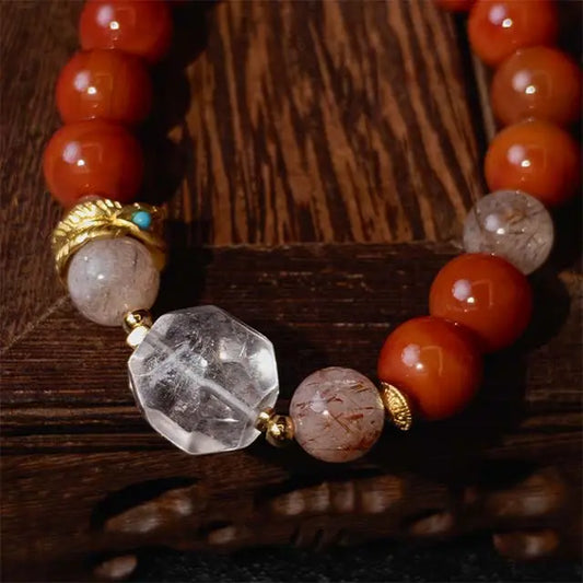 Natural stone bracelet featuring Red Agate, Super Seven, and White Crystal beads, created as protective healing jewelry for emotional and energetic harmony.