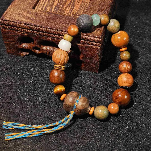Natural Bodhi seed and wood bead mindfulness bracelet, designed as a subtle reminder for meditation and stress relief.
