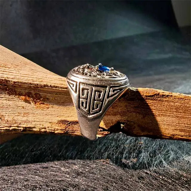 Side view of the Mystic Dragon Ring, showcasing its substantial sculptural depth and ergonomic curve. The solid copper band is designed for a comfortable, secure fit on the finger.