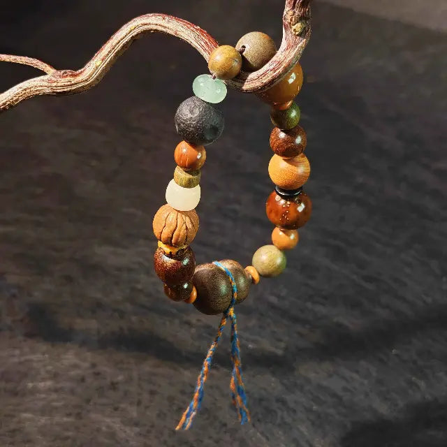 The Serenity Gourd - Handmade Bodhi Seed Meditation Bracelet, a natural wood bead bracelet for mindfulness and calm.