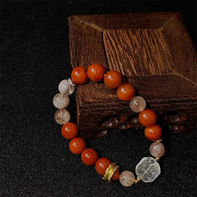 Super Seven and Red Agate bracelet with White Crystal accents, a unique spiritual jewelry piece for energy cleansing, balance, and gentle protection.