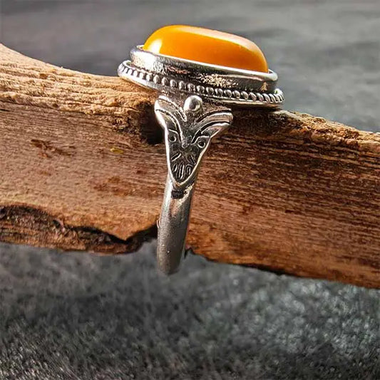 Meaningful gift idea: Tibetan Sun Amber Ring symbolizing warmth and energy.   A piece of spiritual healing jewelry made from authentic Himalayan amber.