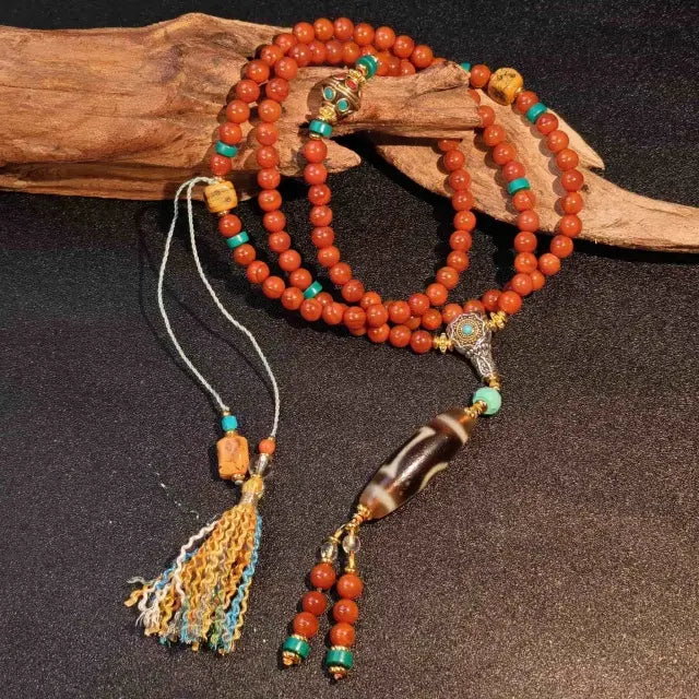 Handcrafted Tibetan red agate mala necklace with long Dzi bead pendant and decorative tassel