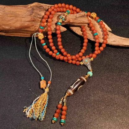 Handcrafted Tibetan red agate mala necklace with long Dzi bead pendant and decorative tassel