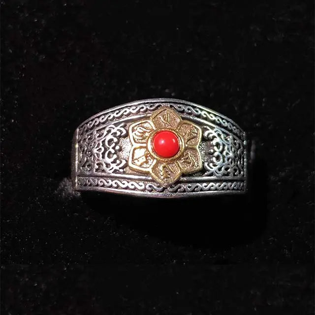 Front view of Tibetan Red Agate Om Mani Padme Hum Ring, a handcrafted spiritual jewelry piece for meditation and peace.