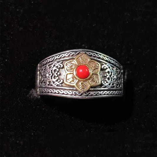 Front view of Tibetan Red Agate Om Mani Padme Hum Ring, a handcrafted spiritual jewelry piece for meditation and peace.