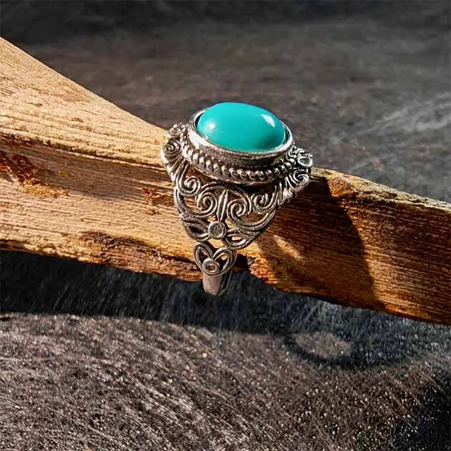 Side view detail of the adjustable Tibetan ring, highlighting the handmade craftsmanship and textured silver band.