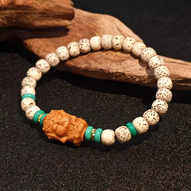 handmade moonseed bead bracelet with sandalwood accent tibetan style artisan jewelry