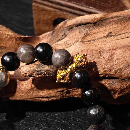 Close-up side view of the adjustable Tibetan silver clasp on the Zaki Lhamo Goddess of Wealth Bracelet, showcasing the secure and finely crafted closure mechanism for a customizable fit.